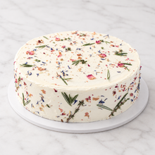 Load image into Gallery viewer, Rustic Floral crepe cake with dried petals, rosemary and thyme on white marble

